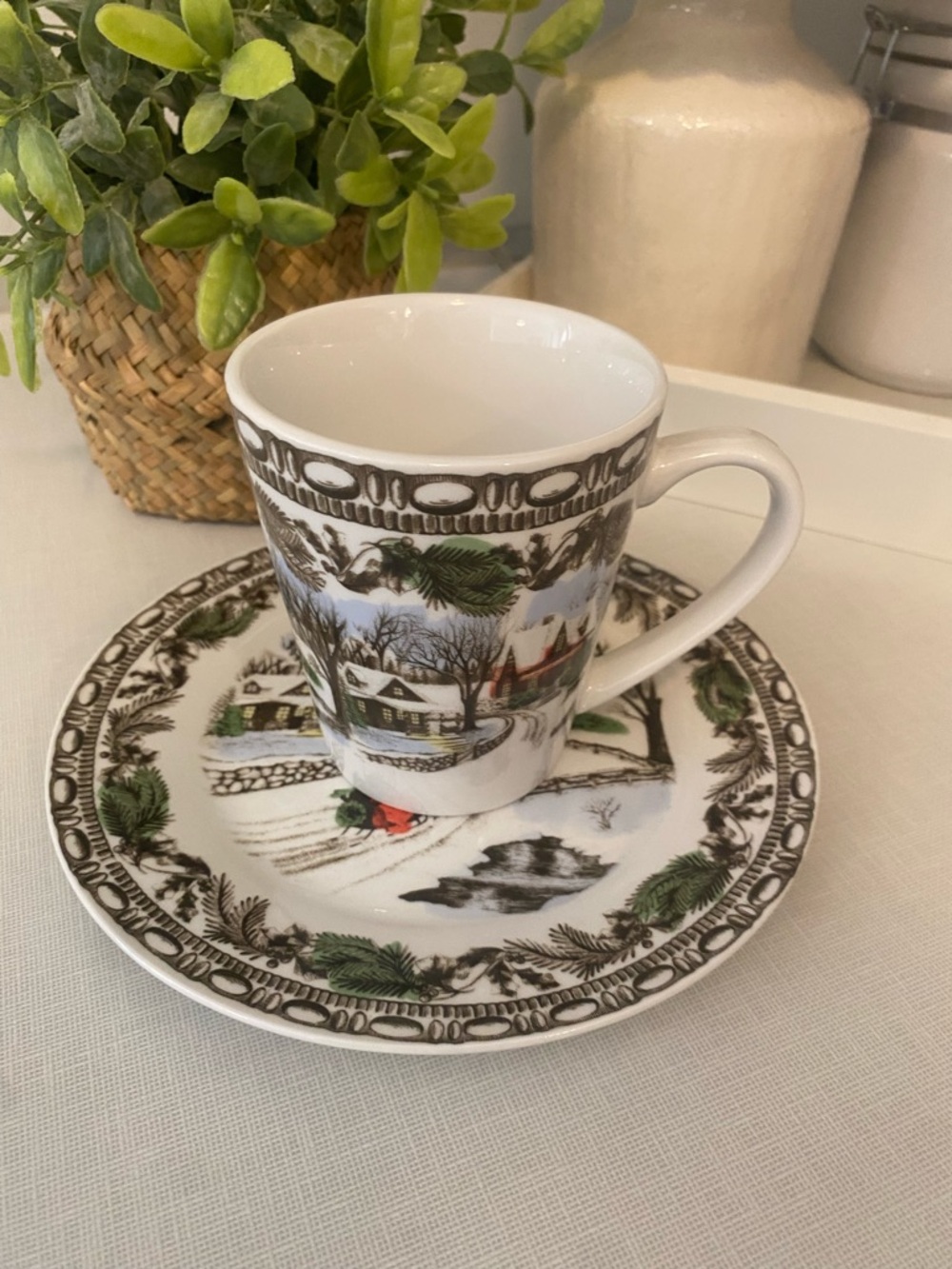 Porcelain Winter Village Cup & Saucer Set in White with Green Accents